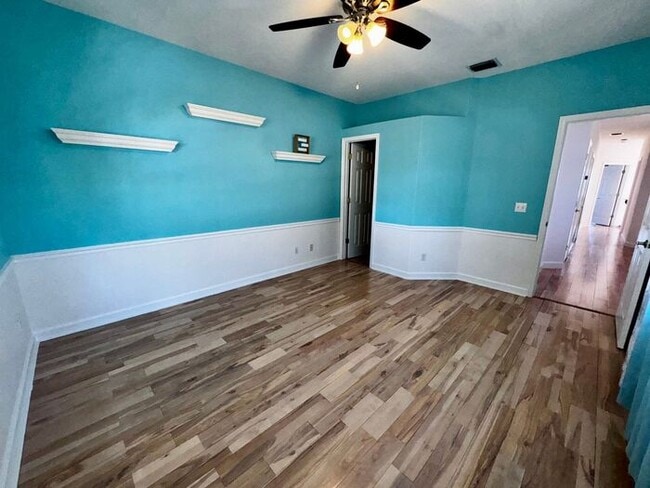 Building Photo - 3 Bedroom 2.5 Bath Cinnamon Bay Home with Stunning view, and Hardwood Flooring!