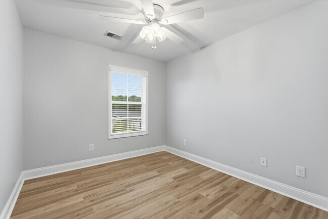 Building Photo - Now available, freshly painted with a community pool!