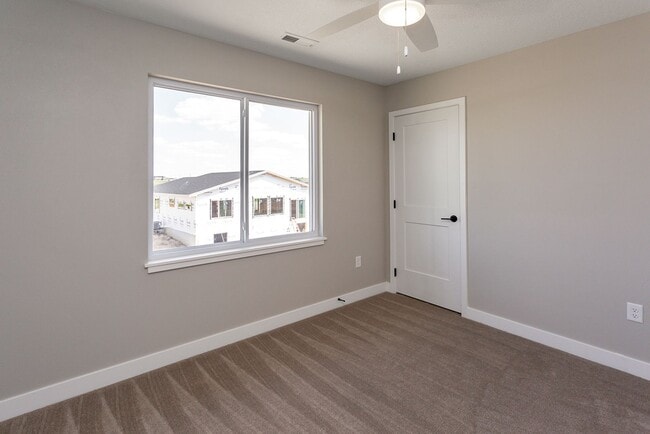 Building Photo - Spacious 4-Bedroom Home with 2-Car Garage & Yard