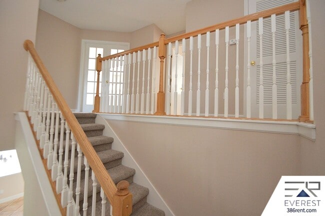 Building Photo - SPACIOUS, FULLY FENCED 4/2.5/2 IN DESIRABLE MATANZAS WOODS