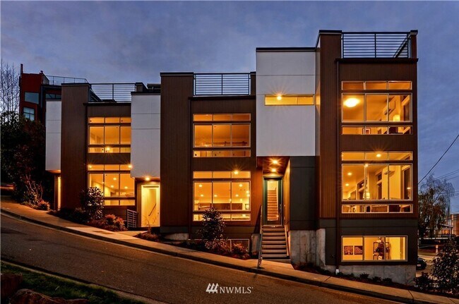 Building Photo - Modern Townhouse with Rooftop Deck & Skyli...