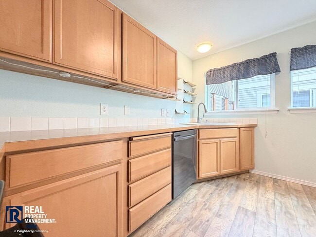 Building Photo - Spacious 4-Bedroom Townhome in Alicia Meadows | Garage, Patio & Pet Friendly