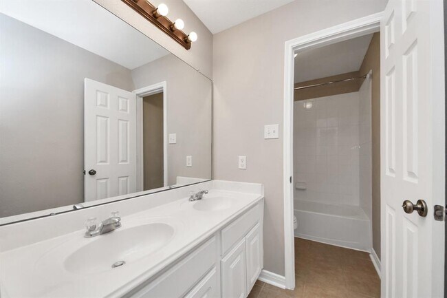 Building Photo - 7447 Oakwood Canyon Dr