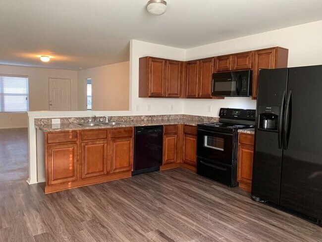 Building Photo - FOUR BEDROOM | TWO BATHROOM