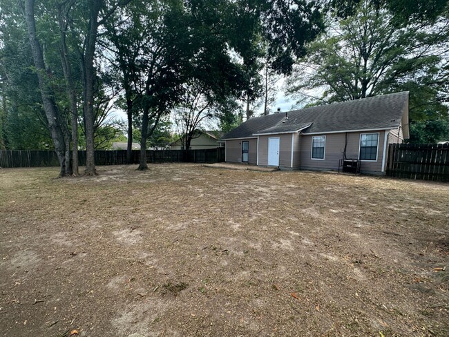 Building Photo - MOVE-IN READY! 3BR/2BA in Quiet Cove | Brick Fireplace | Fenced Yard & Patio!