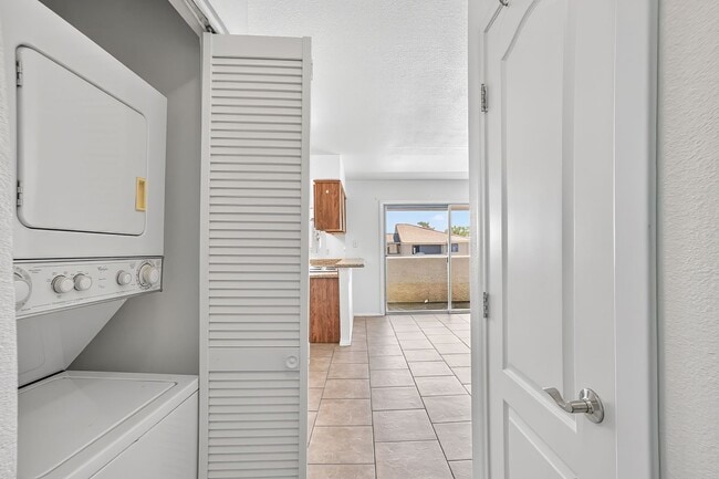 Building Photo - READY TO MOVE-IN UPPER LEVEL 2-BEDROOM CONDO!
