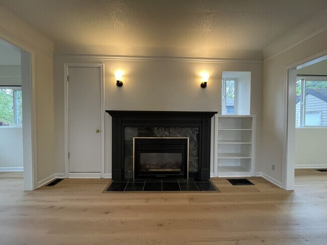 Building Photo - Character-Filled Concordia Home with Flexible Living Spaces & Gas Fireplace