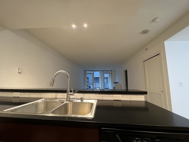 Kitchen facing living room - 76 Cedar St