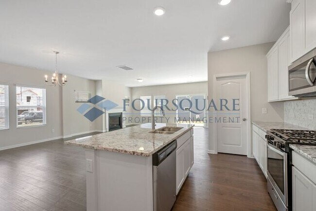 Building Photo - End-Unit Townhome with Loft, Open Floor Plan & Patio, Conveniently Located Near Dining, Shopping,...