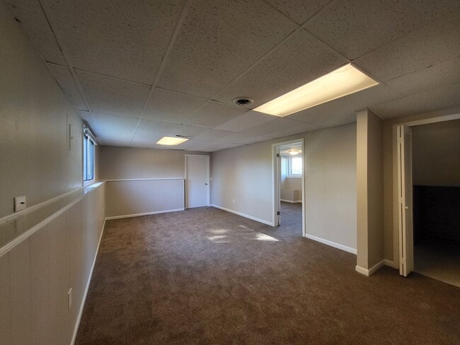 Building Photo - 4 Bedroom split-level home with garage!