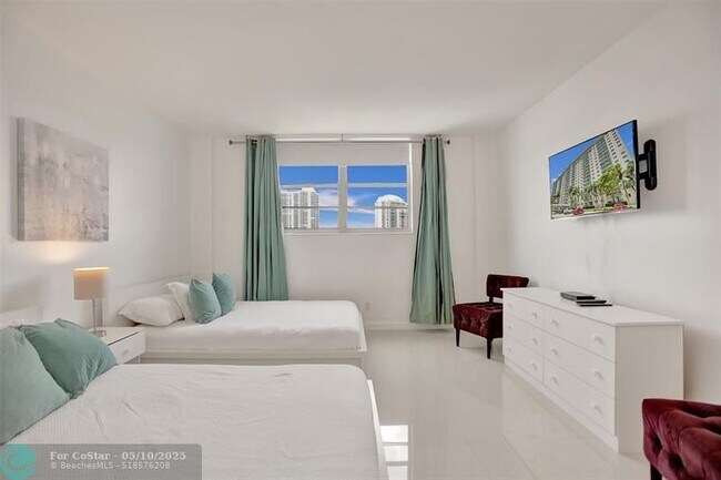 Building Photo - 19390 Collins Ave