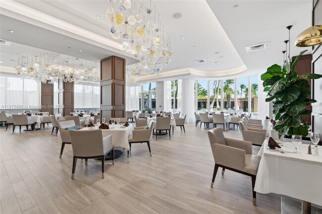 Building Photo - 10155 Collins Ave