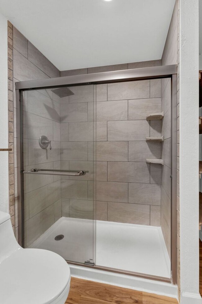 Building Photo - Spacious Poolside Condo!