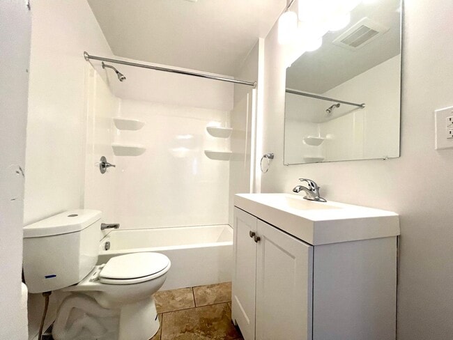 Building Photo - Large House with A/C, deck, updated kitchen, laundry, pet friendly September 1st