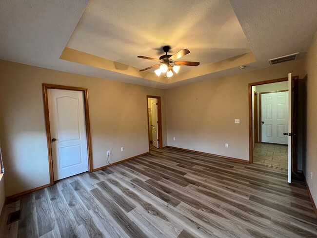 Building Photo - Open Floor plan with plenty of storage space!