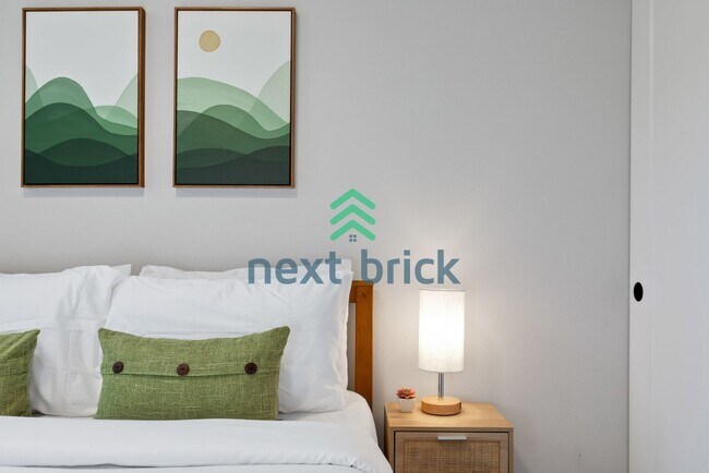 Building Photo - Offer: Unfurnished option available at $3,250, with an optional furnished package for an addition...