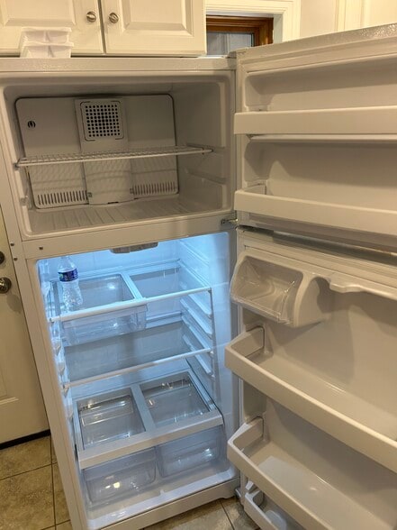 3 yr old fridge - 126 N College St