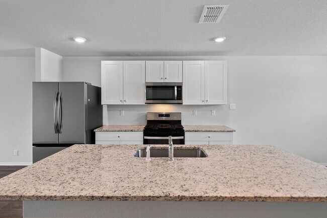 Building Photo - RESORT STYLE AMENITIES!! Multiple Pools. Lazy River. Splash Pad and Water Slides. Fitness Center....