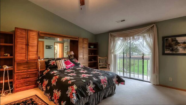 Building Photo - 4bd/3ba HUGE Home w/Hardwood Floors, Russian Fireplace, 2-Car Garage & Fenced Back Yard!