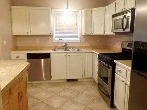 Building Photo - Spacious East Anchorage Home with Yard & Garage!