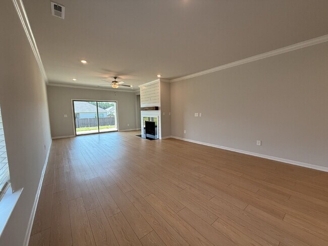 Building Photo - "NEWLY BUILT- Spacious 4-Bedroom Haven with Granite Elegance and Cozy Fireplace in Harvest"