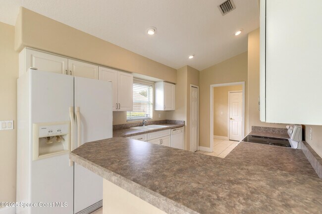 Building Photo - 1442 Areca Palm Dr
