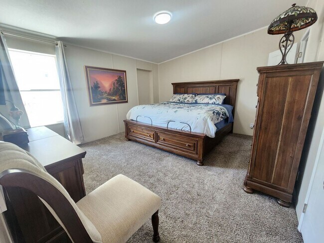 Building Photo - Fully Furnished 3 Bedroom Home coming July...