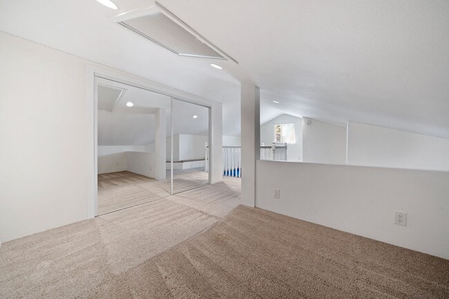 Building Photo - Seawind Upper Unit with Vaulted Ceilings a...