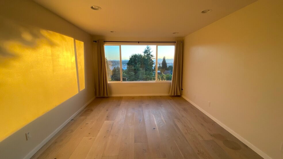 Sunset through the picture window - 4253 Palatine Ave N