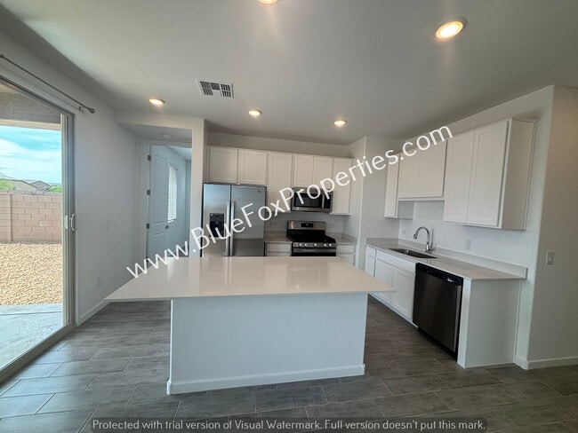 Building Photo - 35049 S Lasso Ln