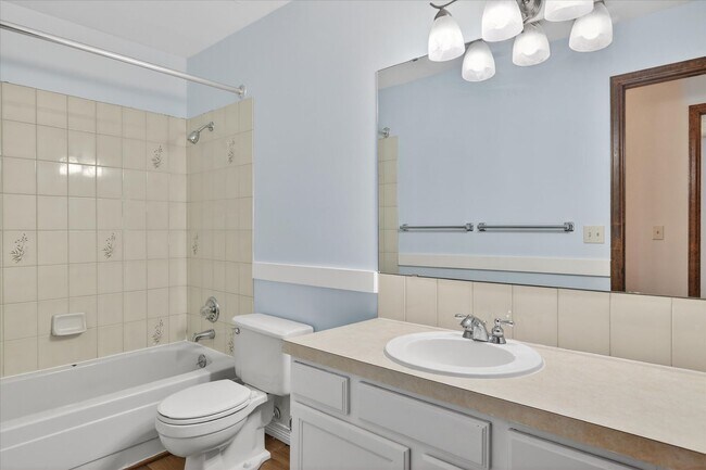 Building Photo - 4BR/4BA Updated Home with Finished Basement Suite & Landscaped Yard