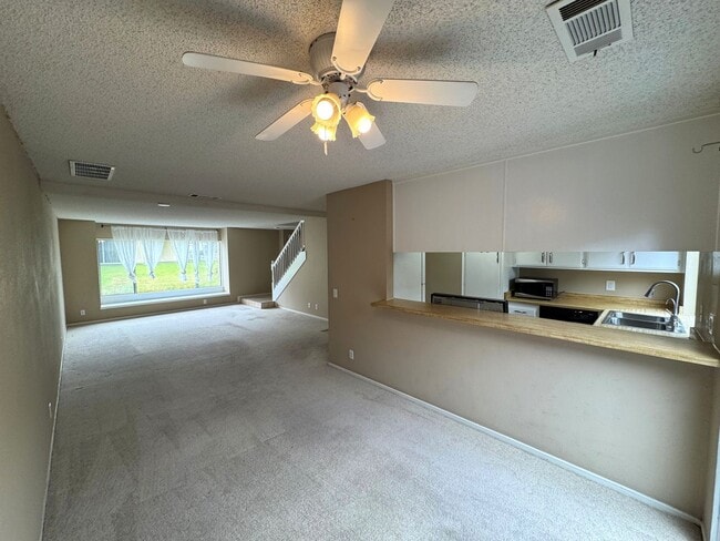 Building Photo - Todd Ranch Townhome- Overlooking The Community Pool!