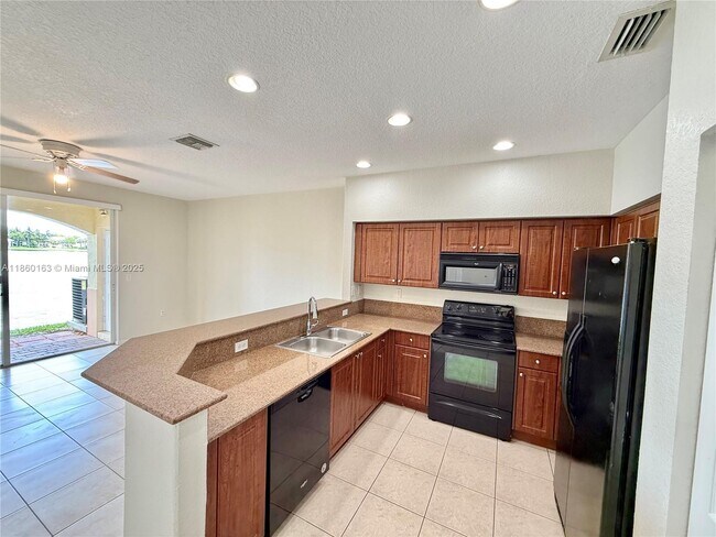 Building Photo - 8380 SW 25th Ct
