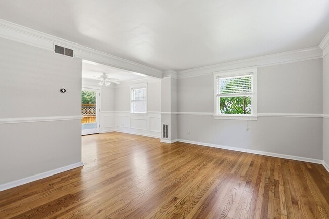 Building Photo - Updated 2BR Condo | Walk to Village District + Private Deck!