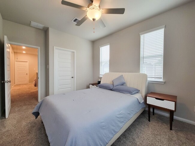 Building Photo - A true gem on a quiet corner lot, this spacious and sun-filled home is tucked away from street no...