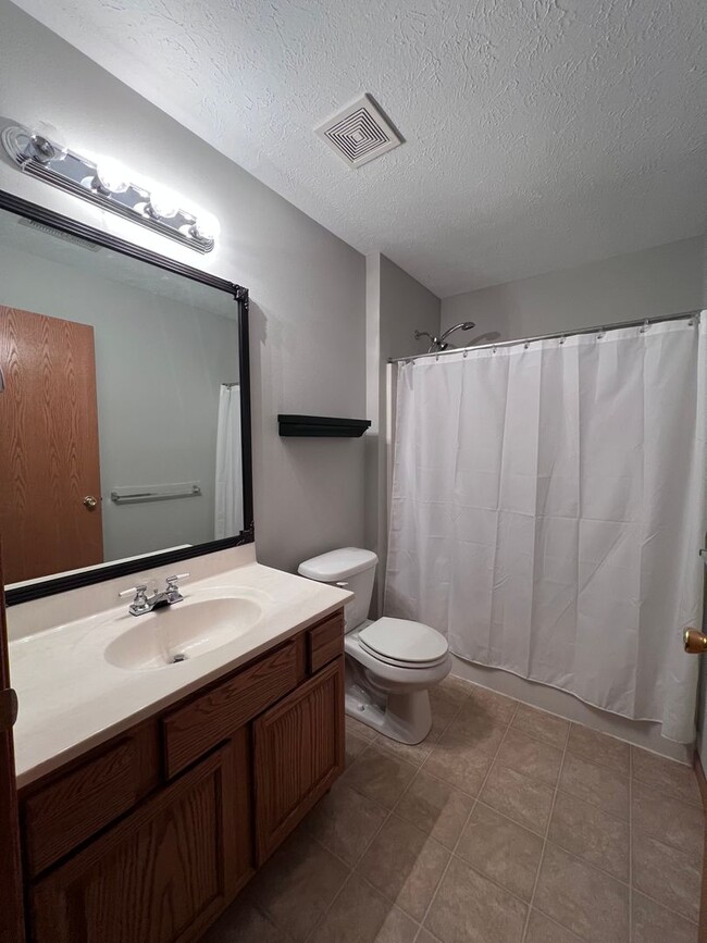 Building Photo - End Unit Two Bed Two Bath Second Floor Con...