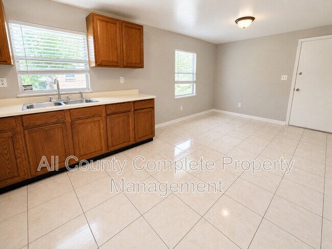 Building Photo - 10881 Key Coral Dr
