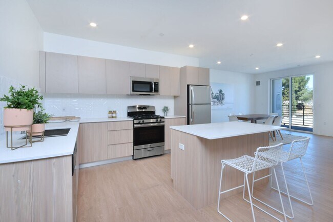 Building Photo - ~ 4 Bedroom 4 Bathroom Washer and Dryer in Unit Gated parking with EV Charging