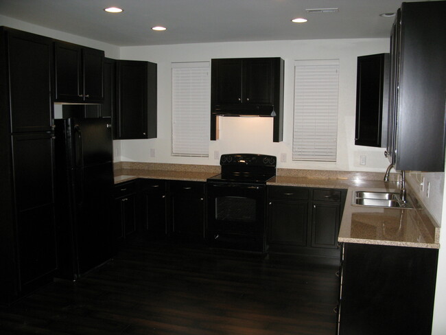 Building Photo - Modern End Unit 3 Bedroom Townhome with So...