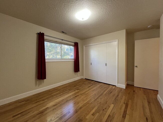 Building Photo - Light-Filled Home with Open Layout, Modern...