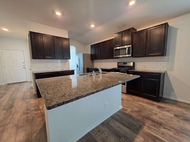 Building Photo - Ready Now – Freshly Painted & Move-In Ready!