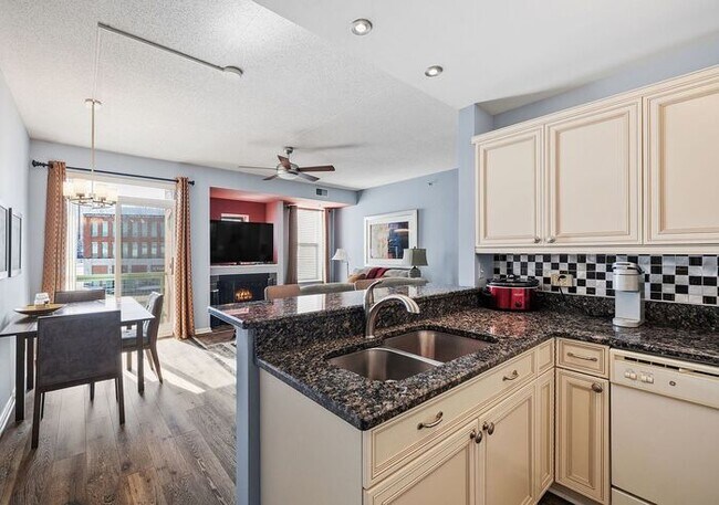 Building Photo - Bright & Spacious 2BR/2BA Condo with Covered Parking Near Train Station