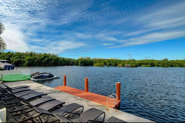 Dock (jetskis are not part of property) - 6520 N Ocean Blvd