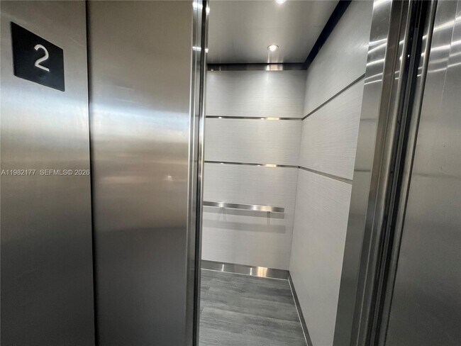 Building Photo - 8595 Sunrise Lakes Blvd