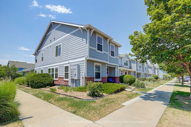 Building Photo - Evolve Real Estate: Beautiful Corner Townhome Available for Move-in on July 21st!