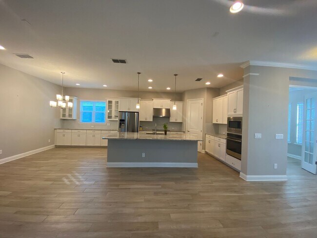 Building Photo - Beautiful 3 bedroom, 2.5 bathrooms  located in The Preserve of Oviedo on the Park
