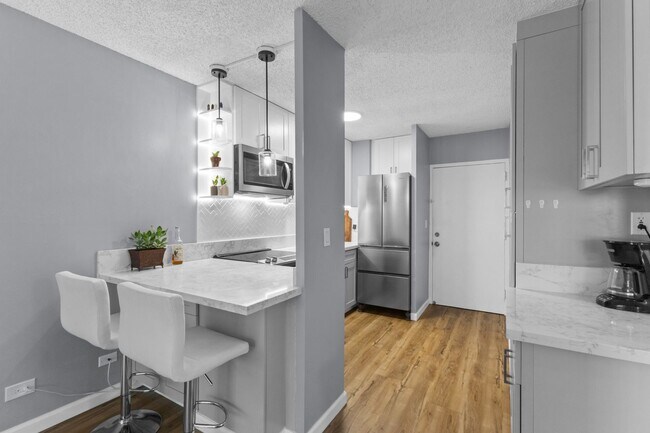 Building Photo - Experience Waikiki Living