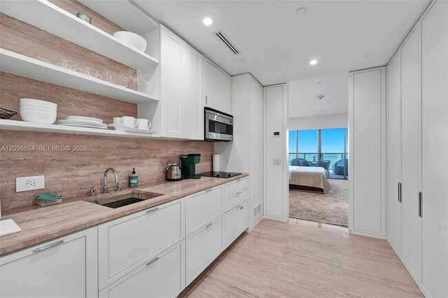 Building Photo - 9703 Collins Ave