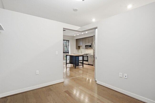 Building Photo - Modern 1BR Condo Steps to Metro, Parks & New Rec Center!