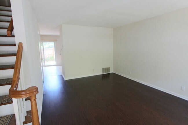 Building Photo - Apply Today! 2 Bedroom - 1.5 Bath condo with garage - heat and hot water included